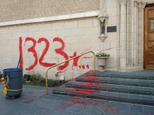 Graffiti on wall of Holy Ghost Catholic Church, Denver, Colorado